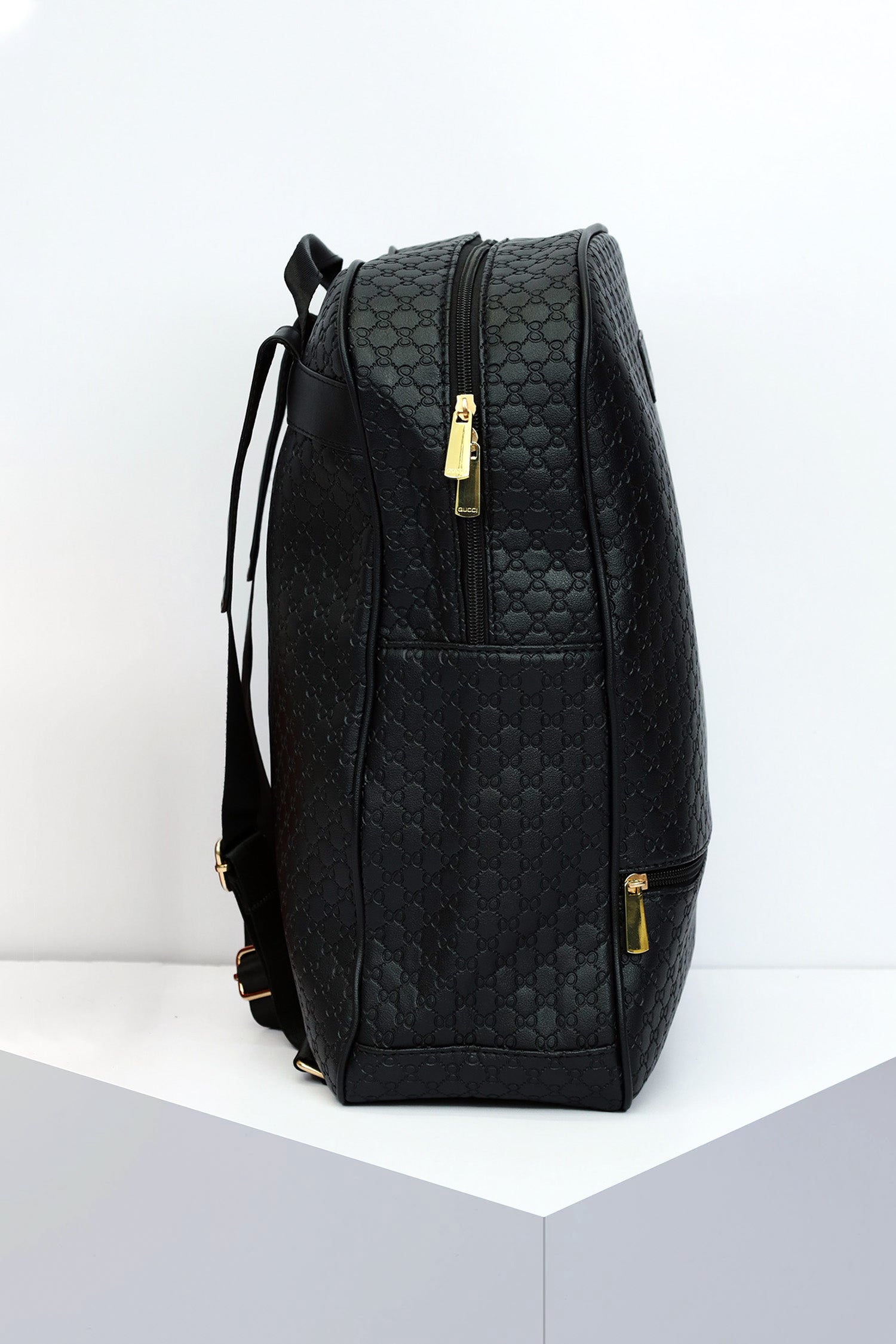 Guci Embossed Textured PU Leather Backpack in Black & Golden