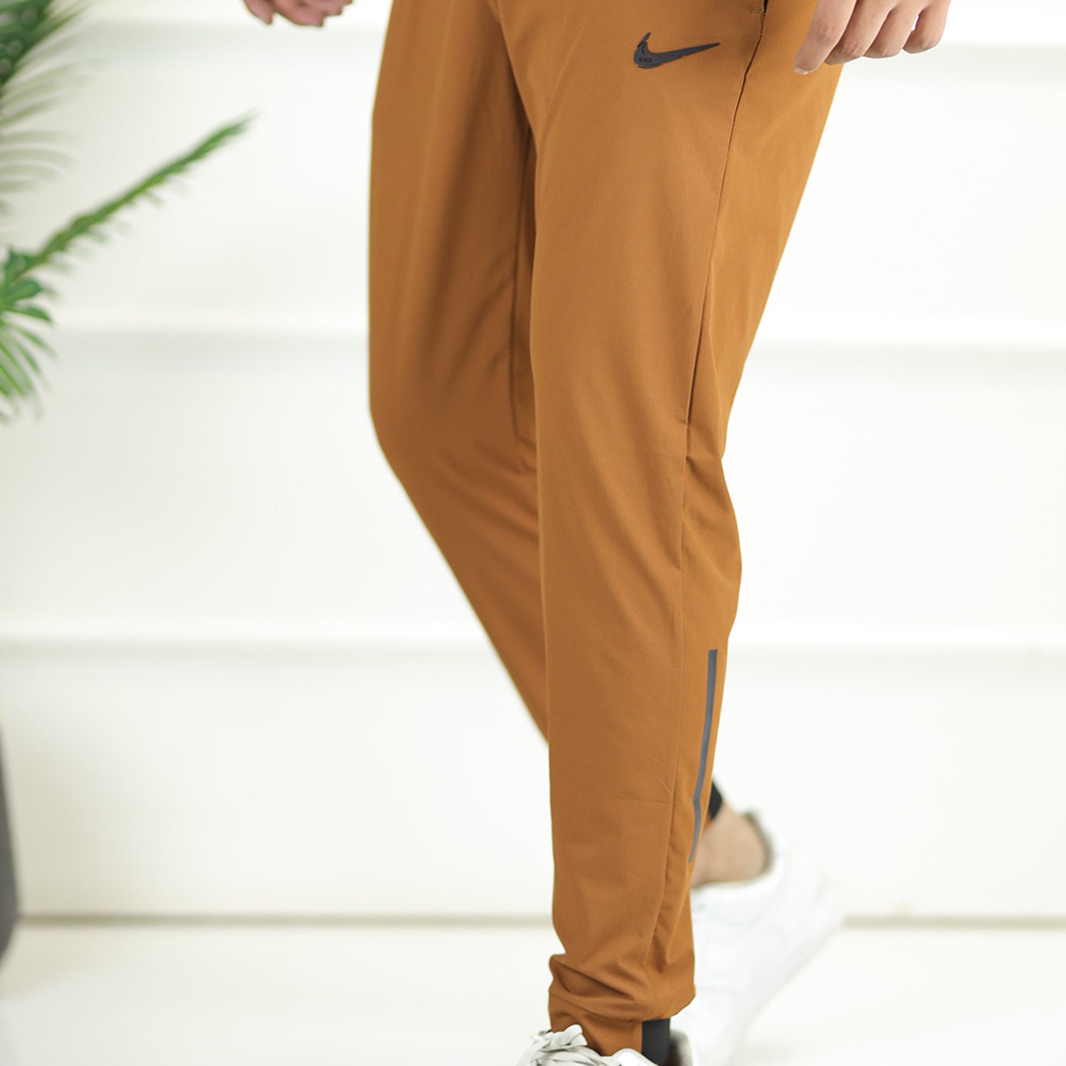Nke Wind Breaker Micro Premium Sportswear Trouser In Rust