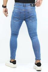 Ankle Fit Ripped Turbo Jeans In Mid Blue