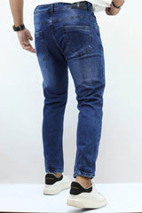 Ripped Turbo Ankle Fit Jeans In Dirty Blue