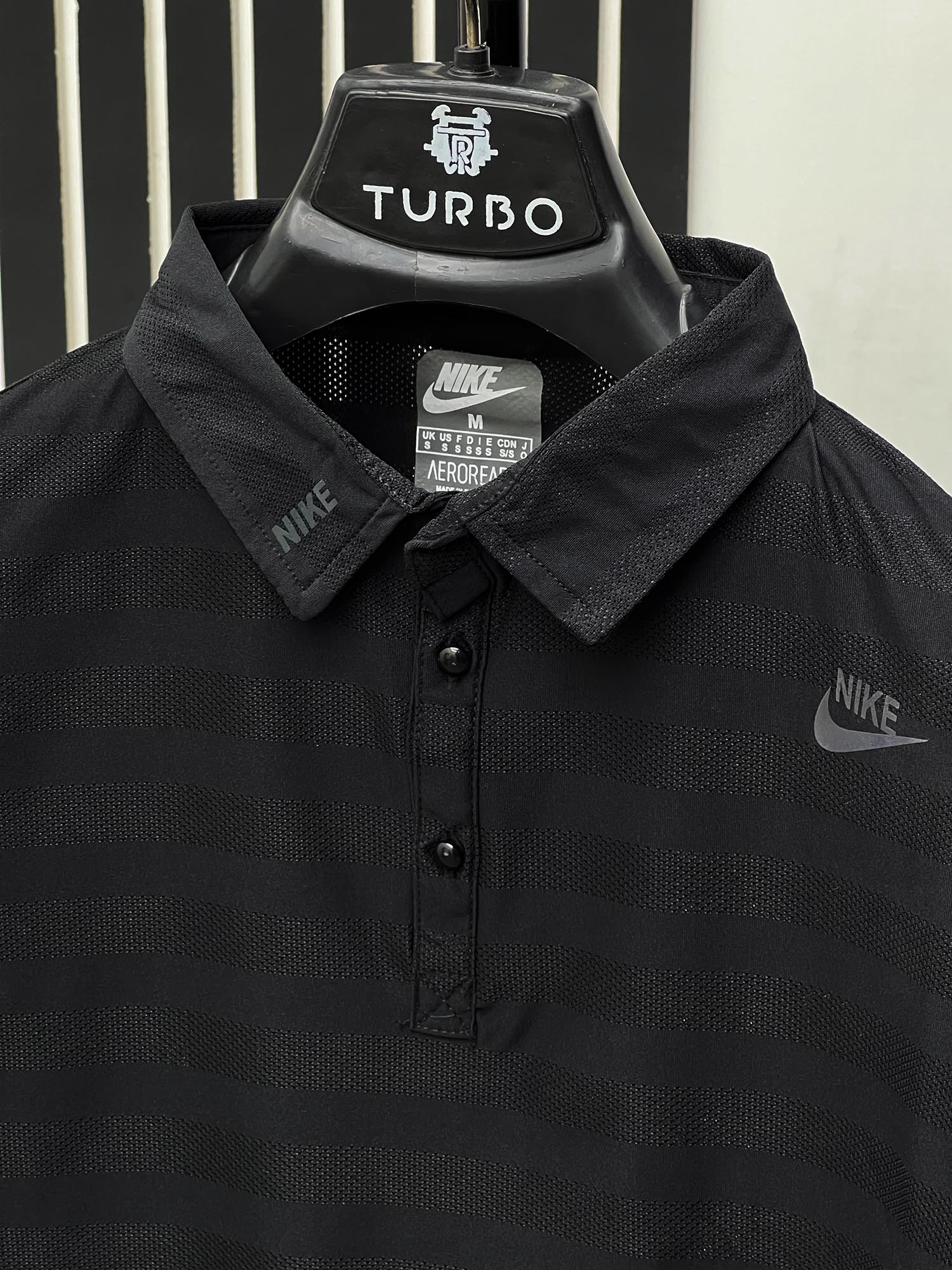 Imported Dry Fit Polo With Reflector Logo In Black