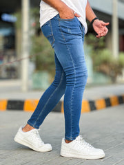 Turbo Ripped Ankle Fit Jeans in Mid Blue