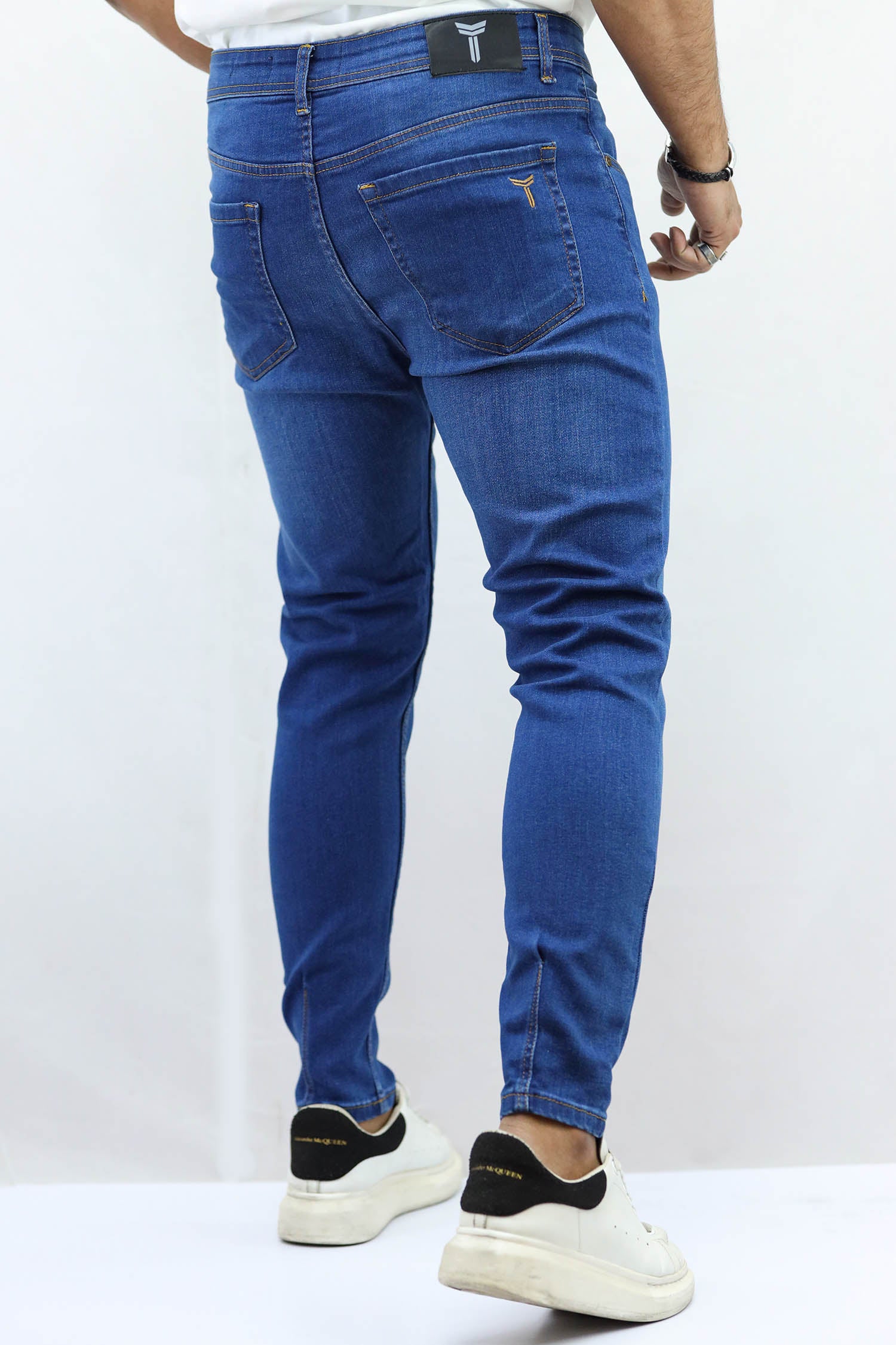 Light Faded Turbo Ankle Fit Jeans In Blue