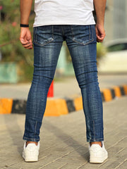 Ripped Ankle Fit Denim Jeans in Dirty Blue