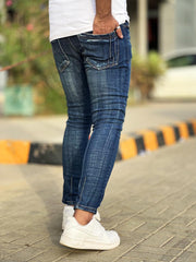 Ripped Ankle Fit Denim Jeans in Dirty Blue