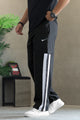 Nke Micro-Stretch Slant Stripe Loose Bottom Trouser In Black