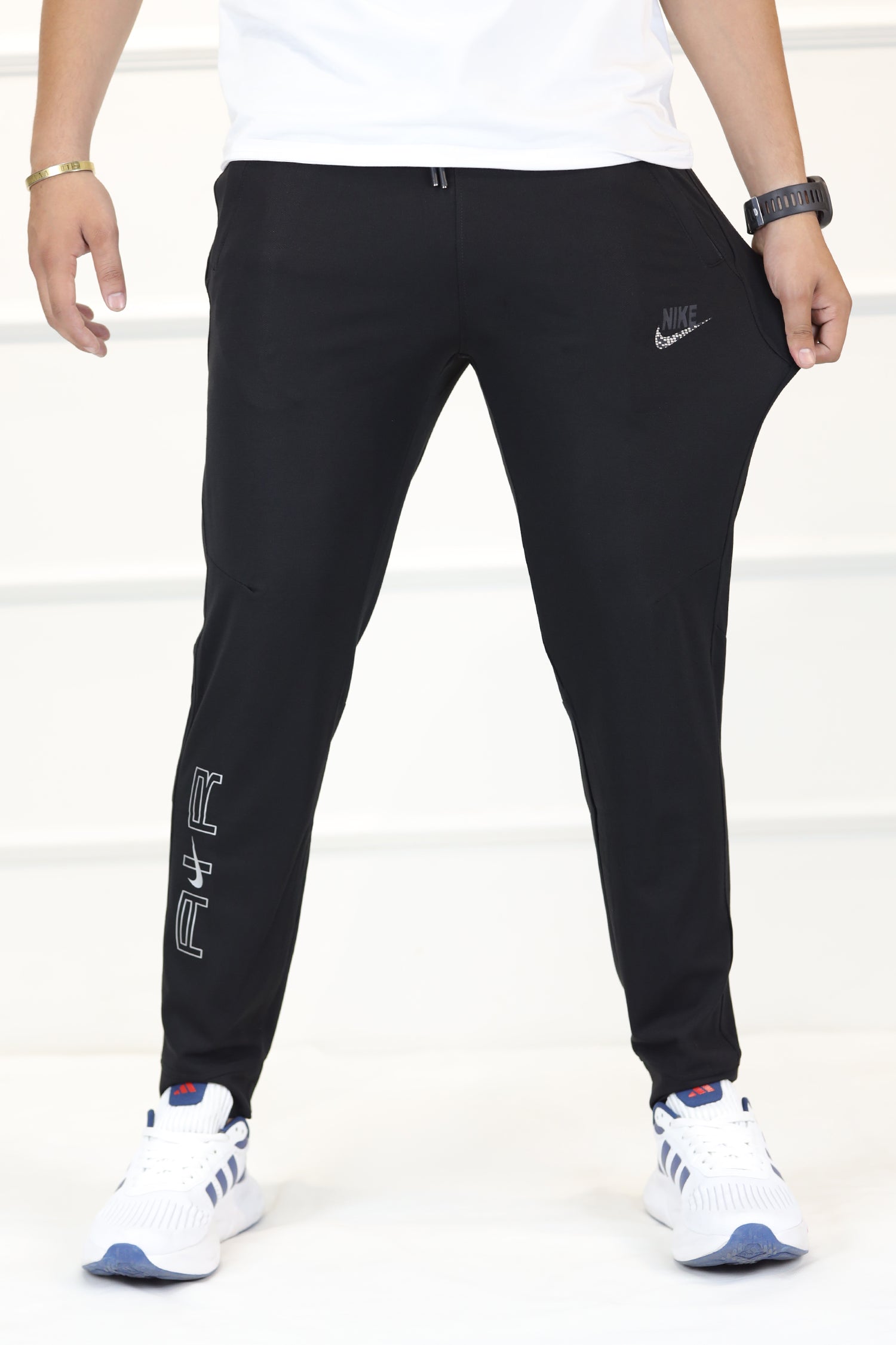 Nke Run Divison Air Grip Fit Sportswear Trouser In Black