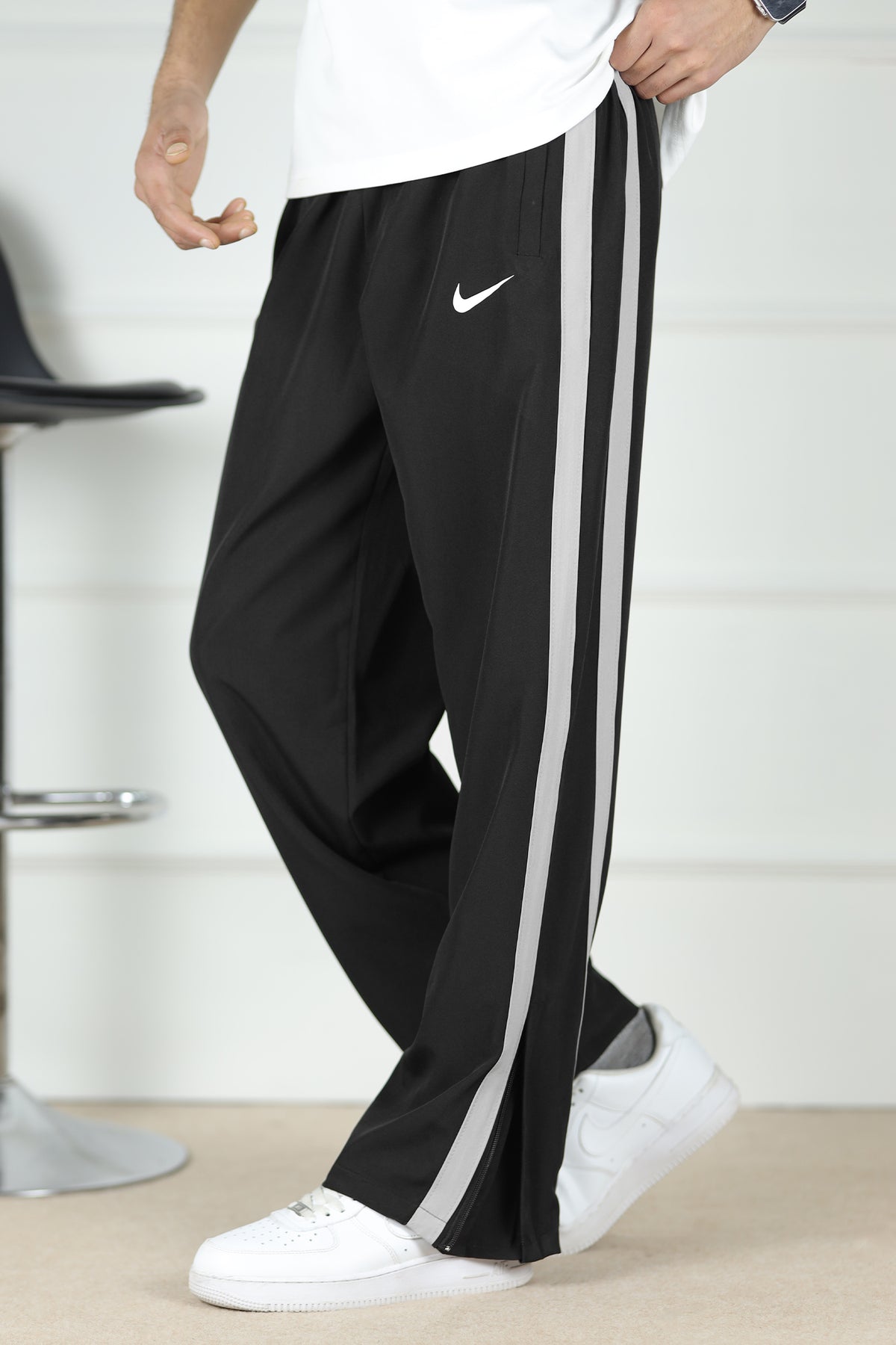 Nke Side Striped Panel Imported Sportswear Micron Trouser In Black
