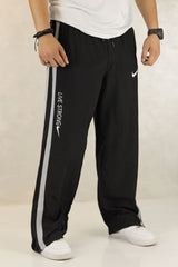 Nke Side Striped Panel Imported Sportswear Micron Trouser In Black