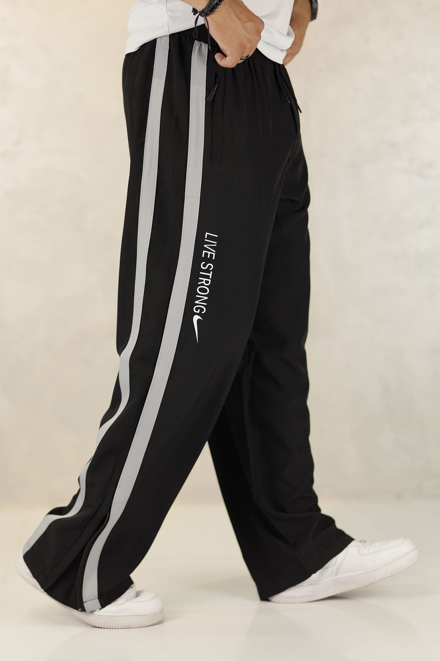 Nke Side Striped Panel Imported Sportswear Micron Trouser In Black