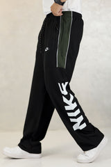 Nke Therma-Fit Versatile Sportswear Micron Trouser In Black