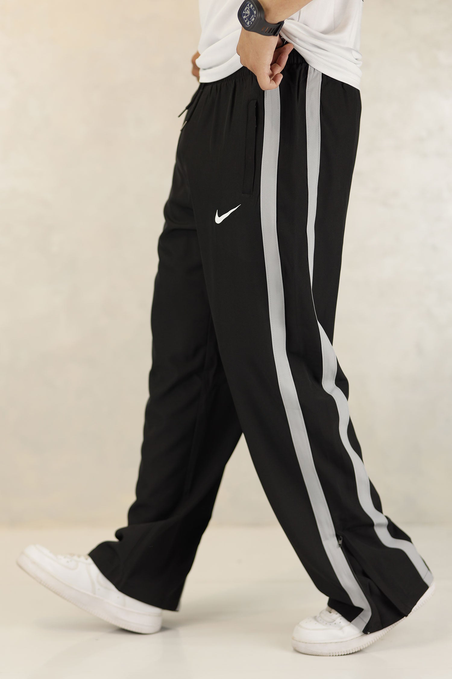 Nke Side Striped Panel Imported Sportswear Micron Trouser In Black