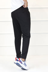 Nke Run Divison Air Grip Fit Sportswear Trouser In Black