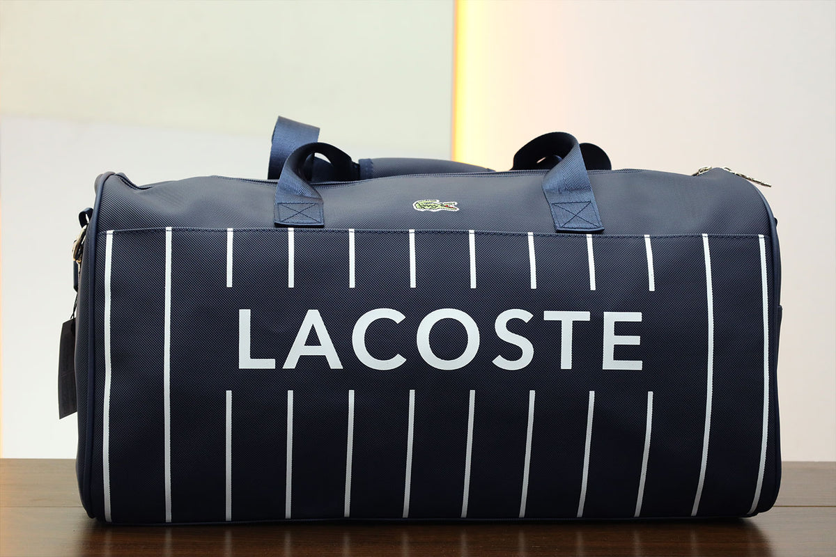 Lacste Imported Signature Lining Travel bag in Navy Blue