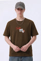 Turbo News HeadLines Graphic Tee In Brown