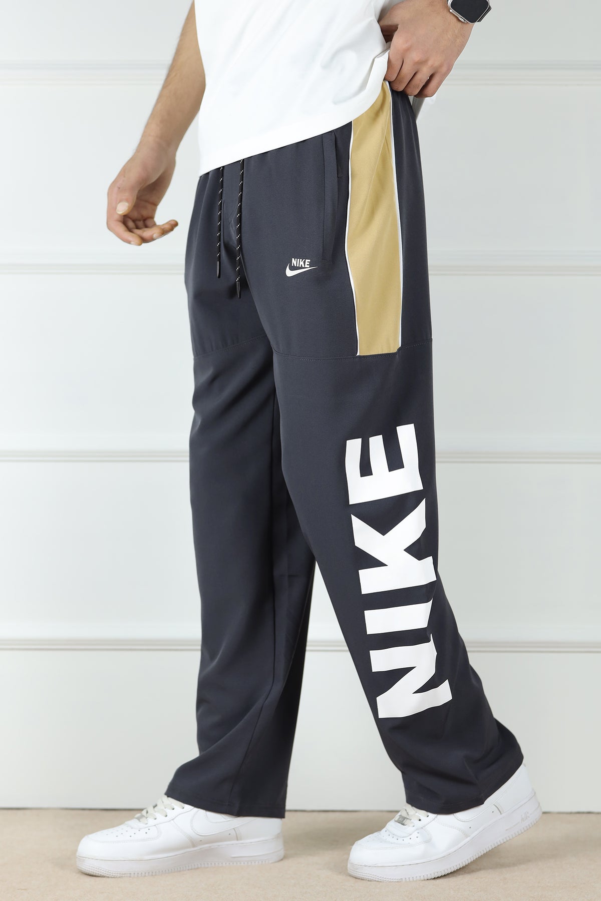 Nke Therma-Fit Versatile Sportswear Micron Trouser In Dark Grey