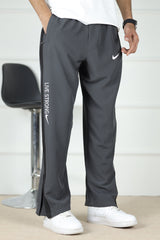 Nke Side Striped Panel Imported Sportswear Micron Trouser In Dark Grey