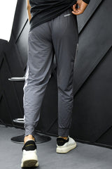 Adds Signature Side Stripes Sportswear Trouser in Grey