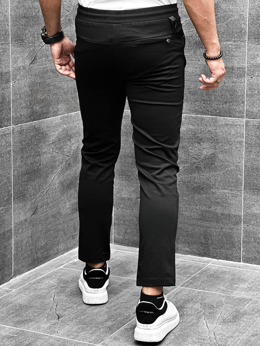Nke Front Reflector Logo Men Trouser In Black
