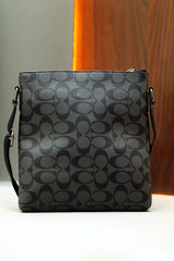 Coah Signature Print PU Leather Cross Body Bag in Black