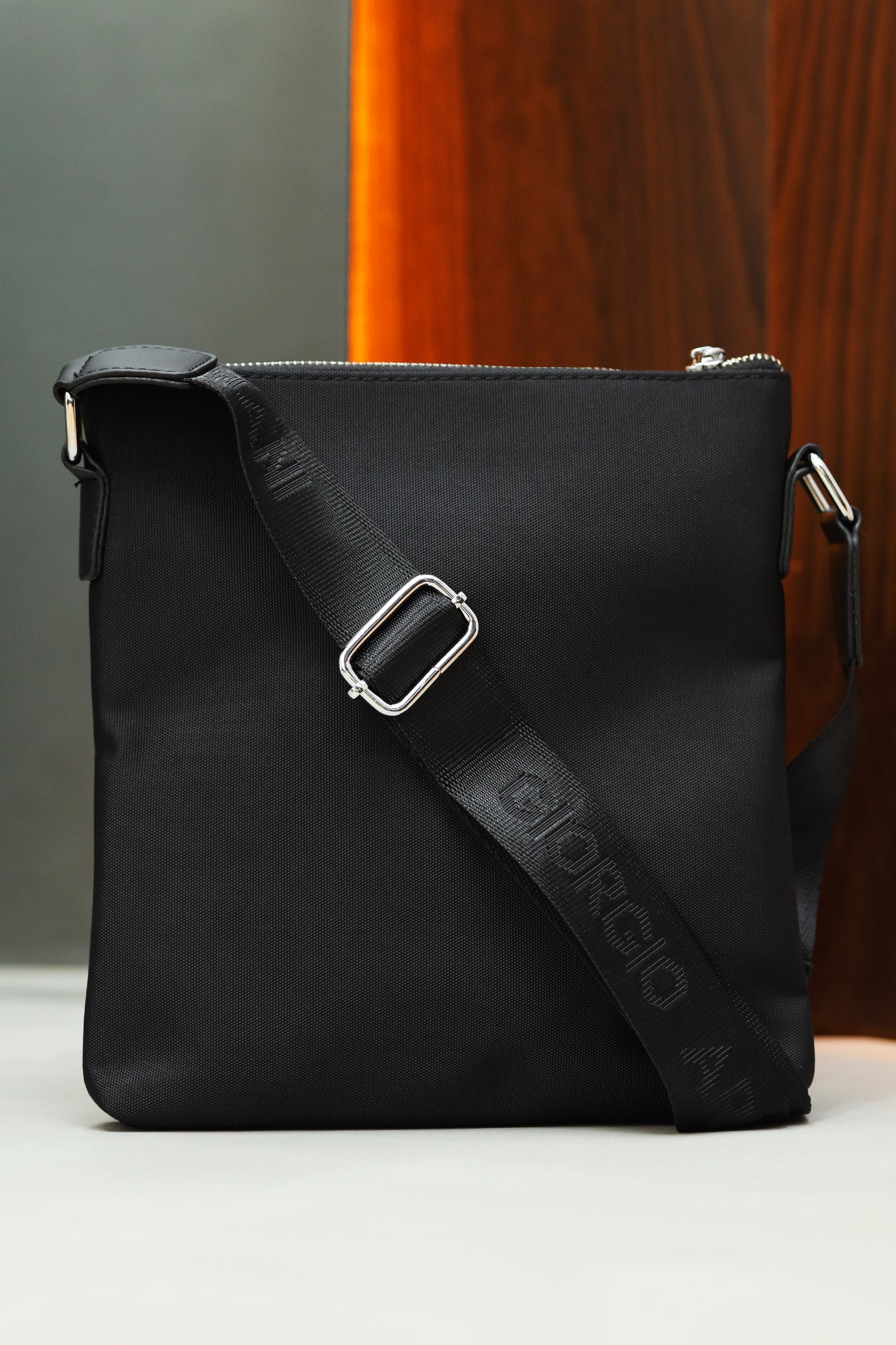 Armni Imported Front Pocket Cross Body Bag in Black