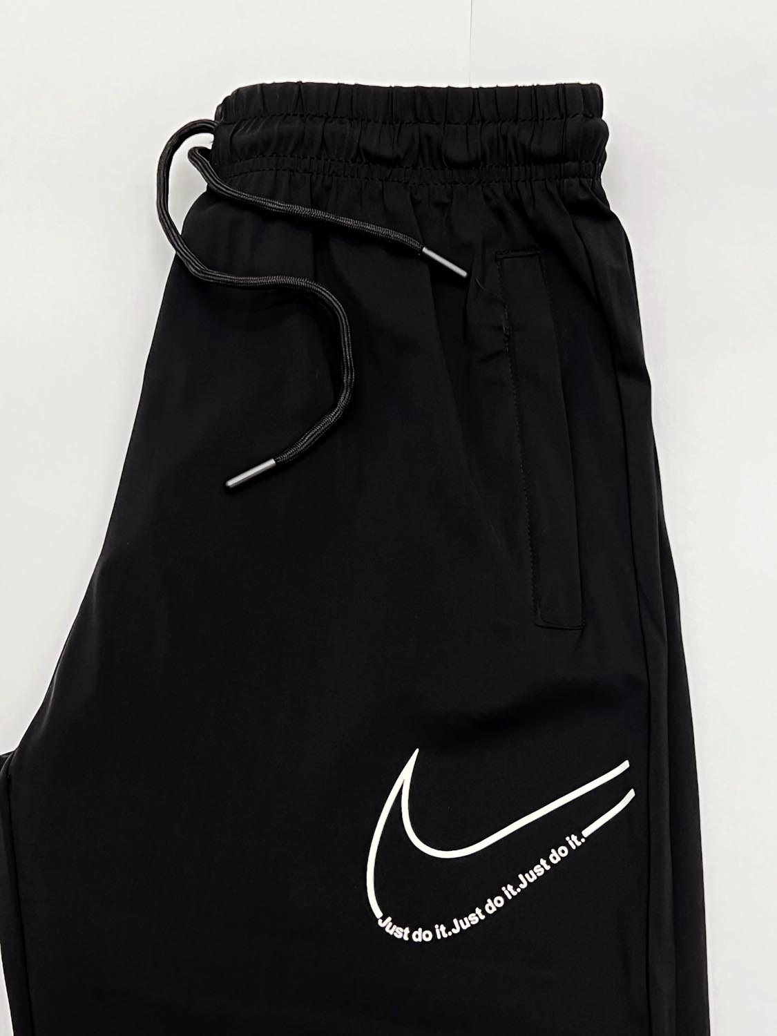 Nke Printed Slogan Imported Trouser In Black