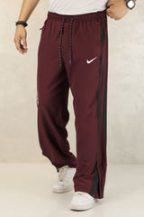 Nke Side Striped Panel Imported Sportswear Micron Trouser In Maroon