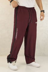 Nke Side Striped Panel Imported Sportswear Micron Trouser In Maroon