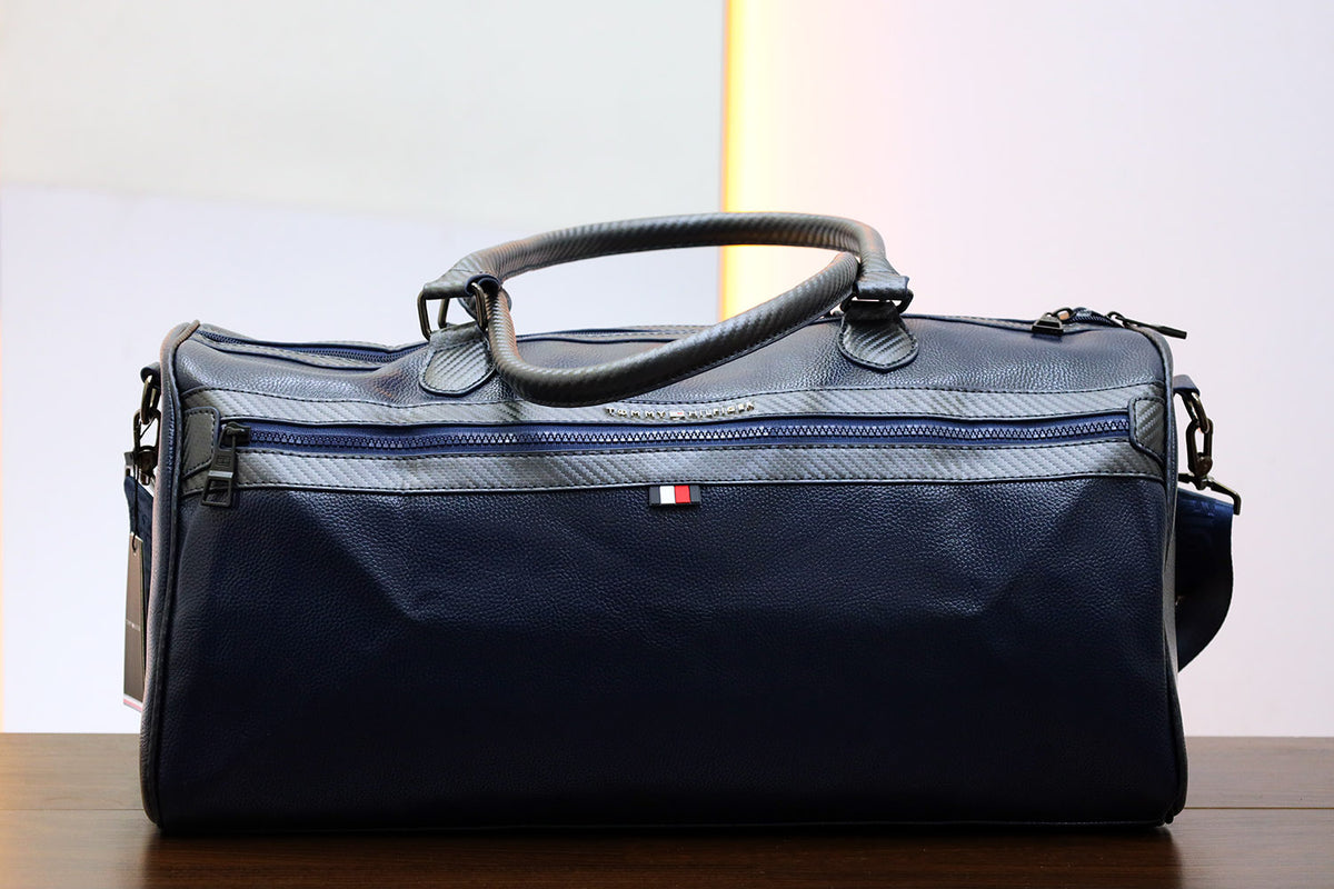 Tomy Hilfgr Imported Signature Strap Travel bag in Navy Blue