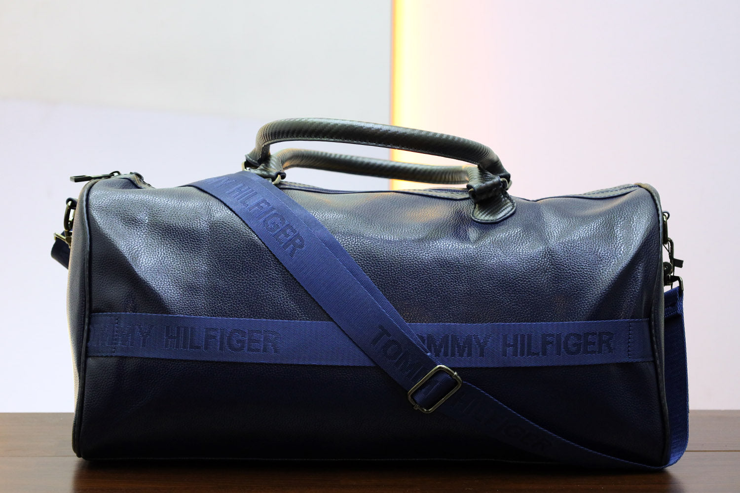 Tomy Hilfgr Imported Signature Strap Travel bag in Navy Blue