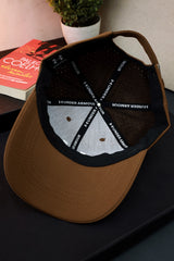 Und Arm Embroidered Logo Cotton Cap In Brown