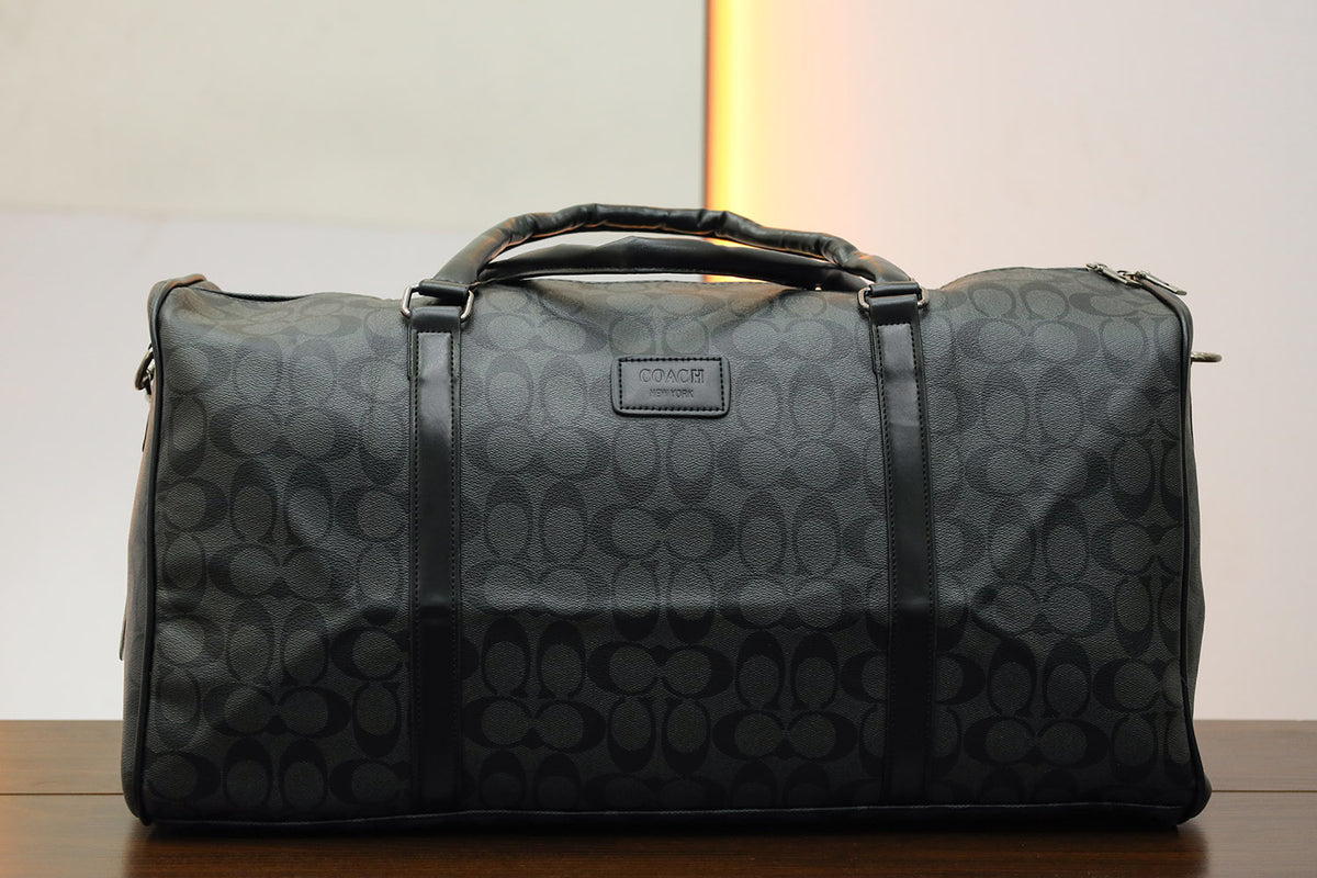 Coah Imported Signature Print Travel Bag in Dark Grey