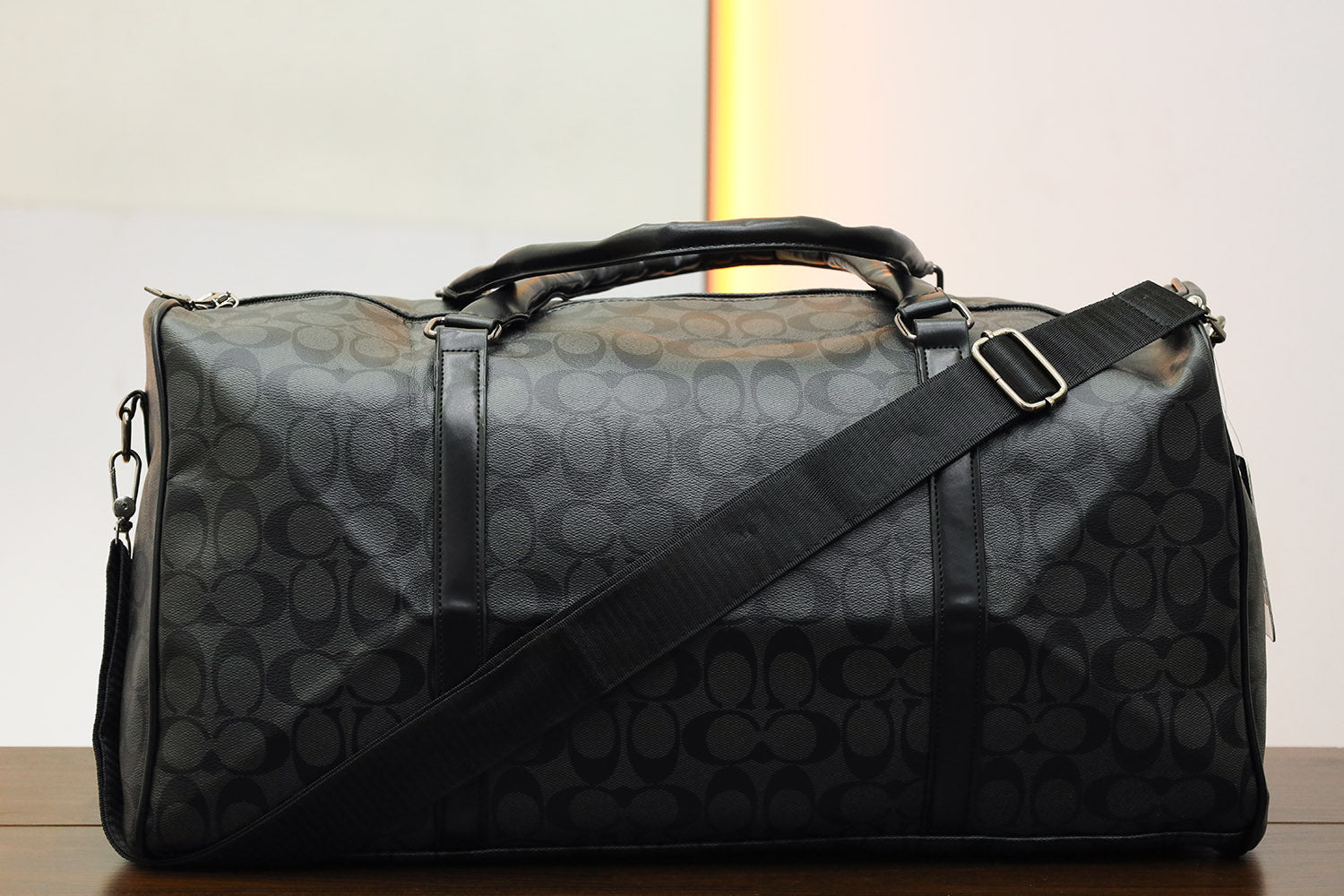 Coah Imported Signature Print Travel Bag in Dark Grey