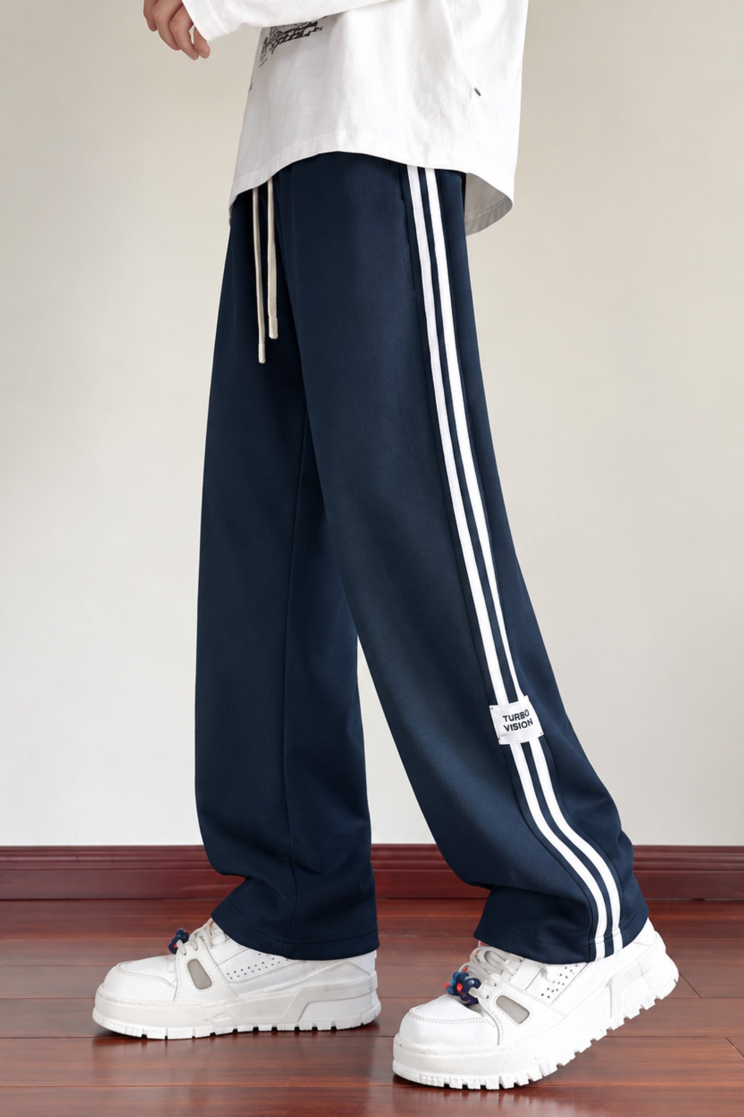Turbo Side Stripe Drawstring Loose Bottom Trouser In Navy Blue