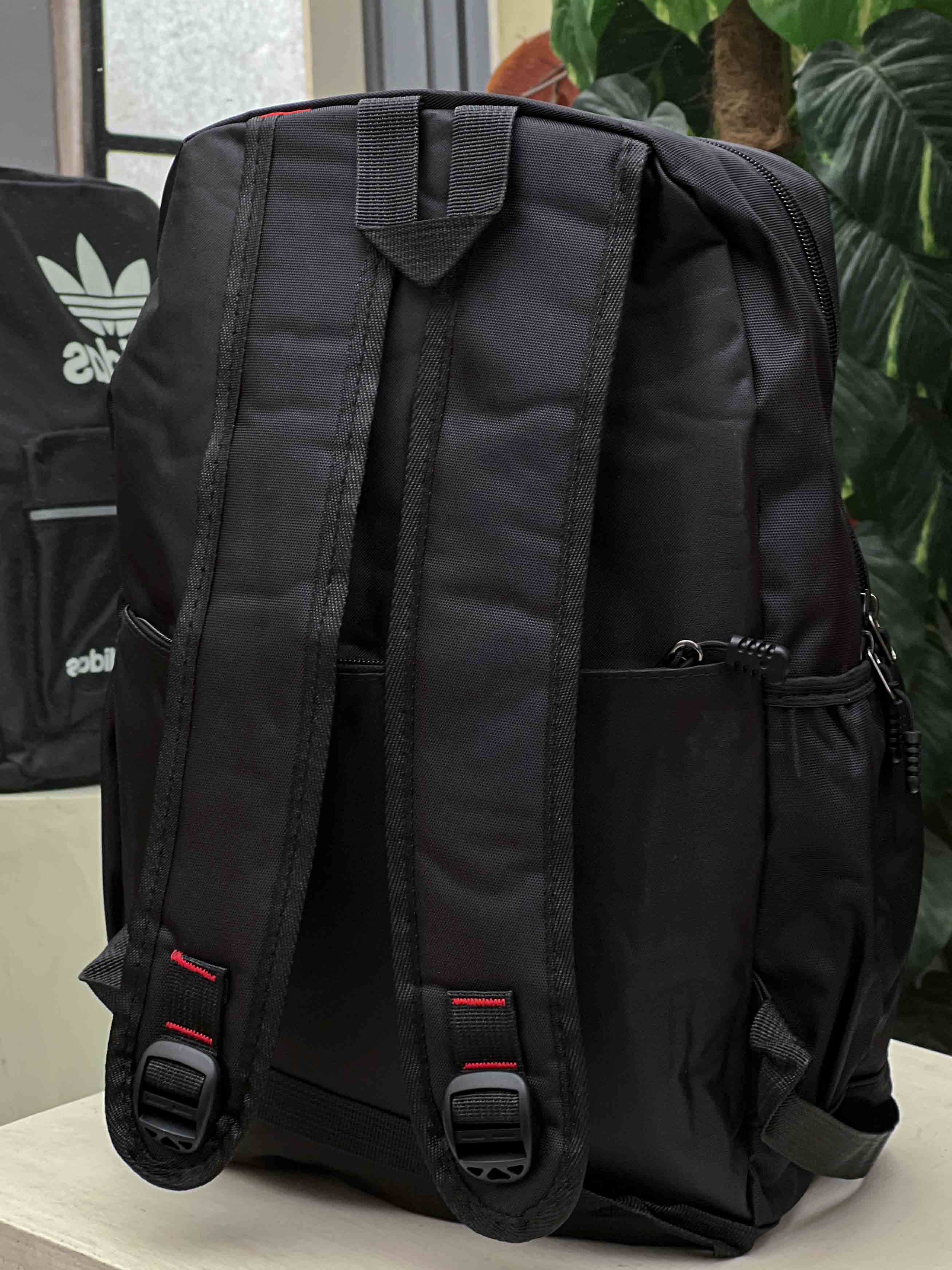 Adds Logo Front Zip Style Backpack in Black