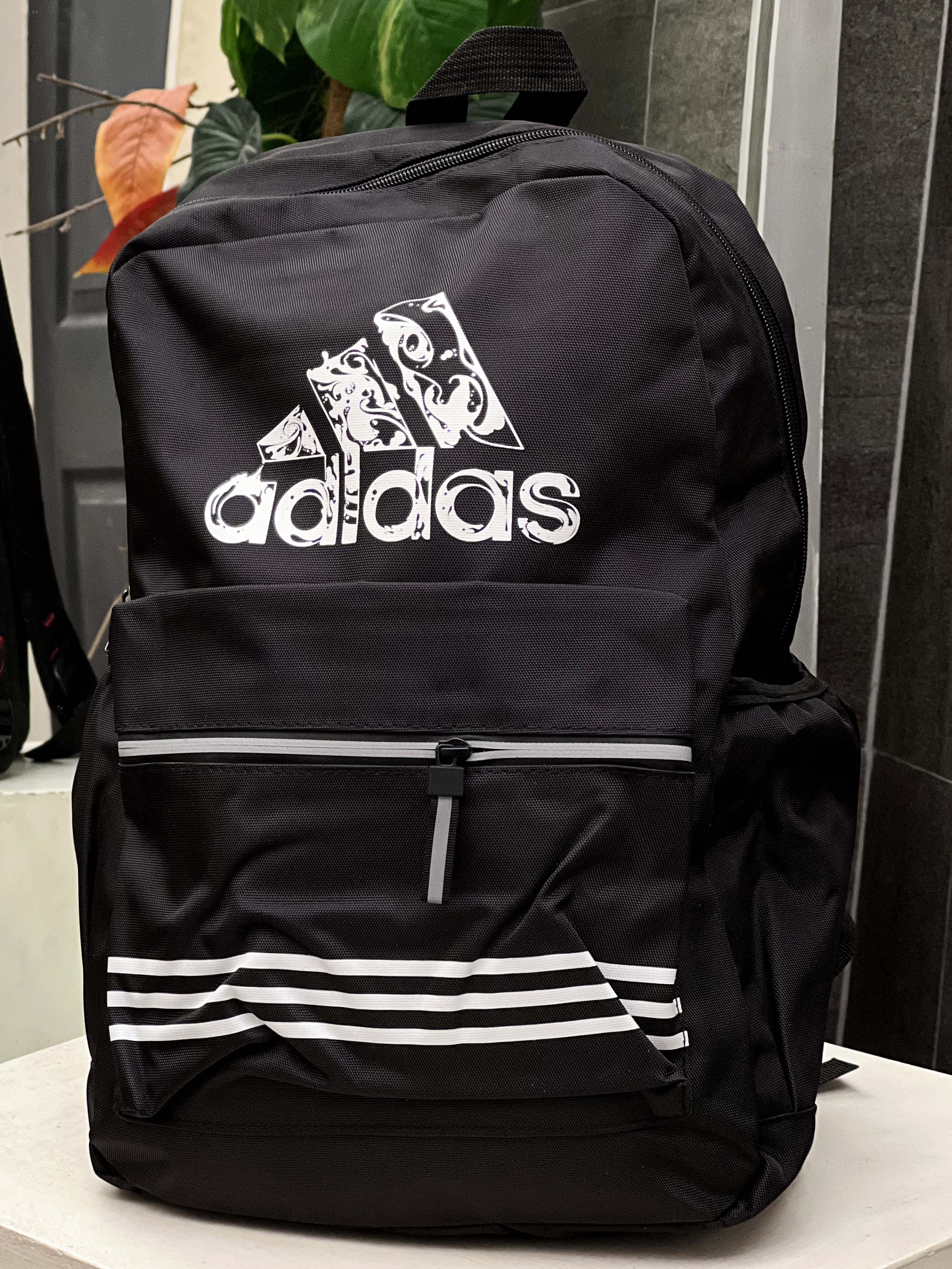 Adds Front Pocket Style Backpack in Black