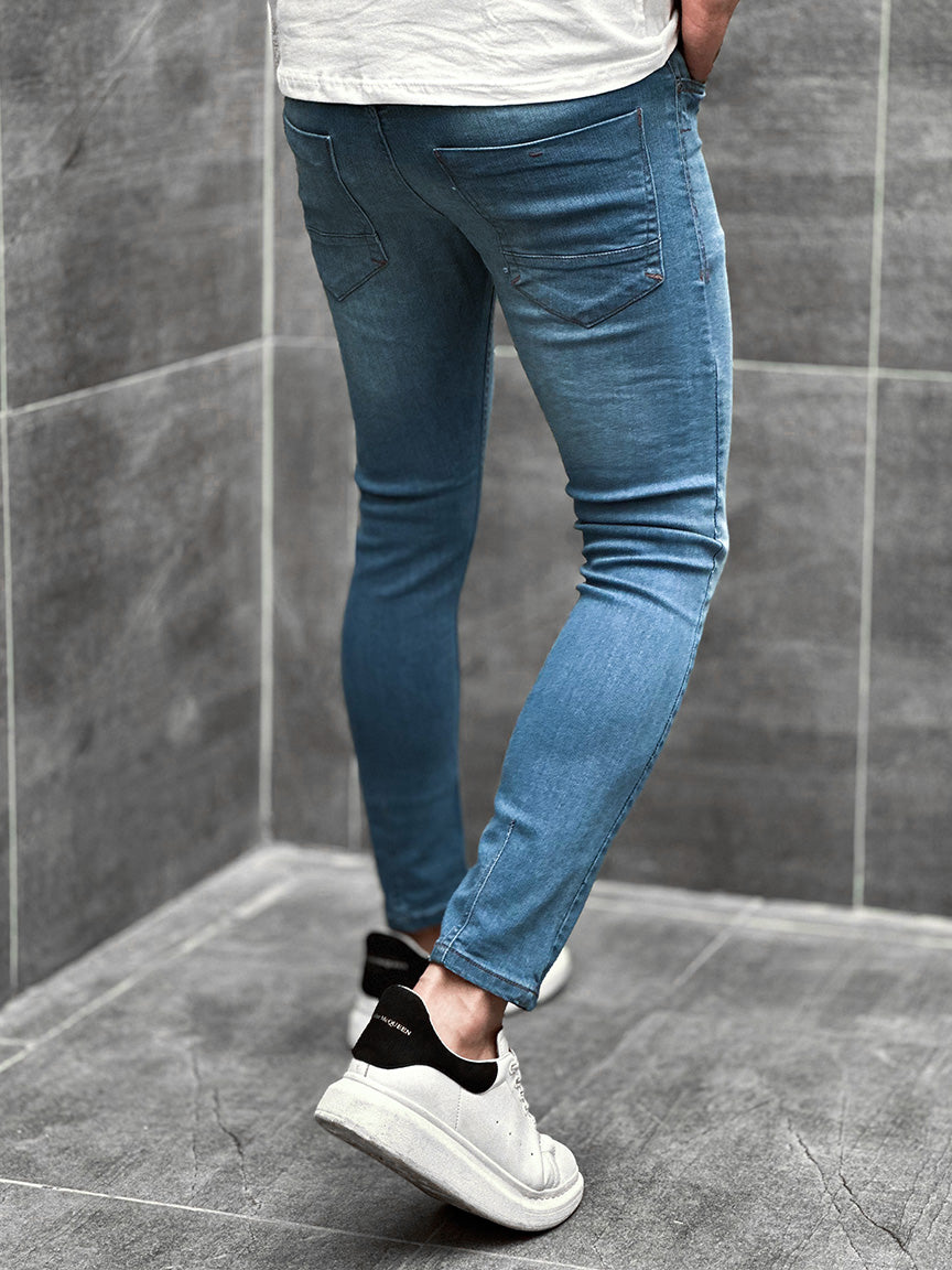 Light Faded Ankle Fit Turbo Jeans in Mid Blue