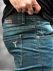 Turbo Back Pocket Logo Ankle Fit Jeans in Dirty Green