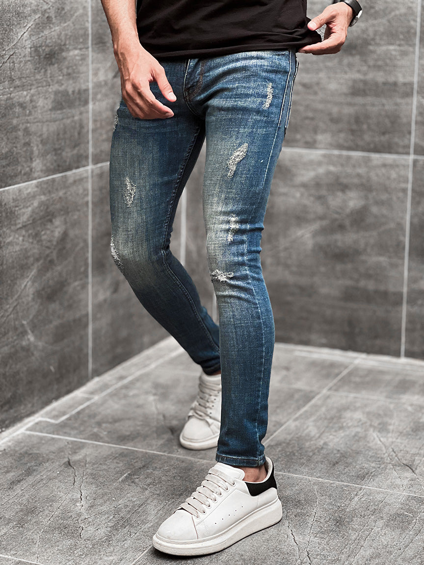 Ripped Ankle Fit Denim Jeans in Mid Blue
