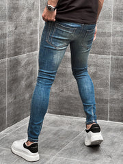 Ripped Ankle Fit Denim Jeans in Mid Blue